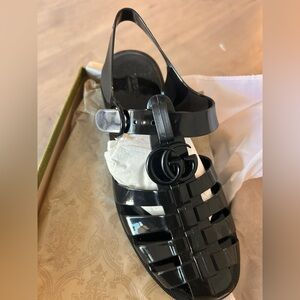 Gucci Women’s GG Shiny Rubber Gladiator Sandal